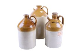 A group of three assorted stoneware chemical flagons. Including Parozone and Domestos, etc. Max.