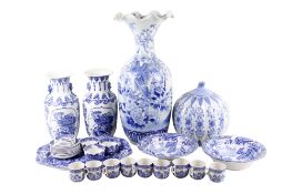 A collection of assorted vintage and modern blue and white ceramics.