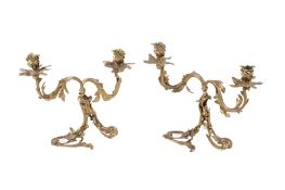 A pair of brass Rococo style candelabra. Stamped F&S to the base.