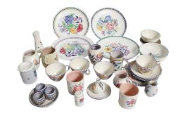 A collection of assorted mostly mid-century Poole Pottery. Including plates, bowls and jugs, etc.