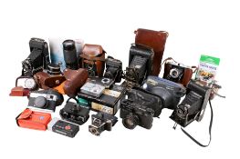 A collection of assorted vintage film cameras. Including Fujifilm instax 200, Kodak no.