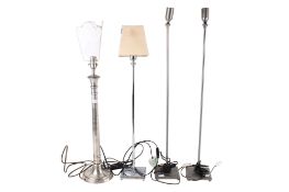A group of four table lamps.