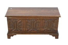 A 20th century oak blanked box. Raised on bracket supports.