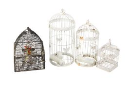 A group of four assorted birdcages. Max.