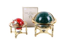 Two gemstone terrestrial globes and an atlas. Globes on gilt metal gimbal stands. Max.