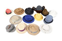 A large collection of assorted gentleman's winter and summer hats.