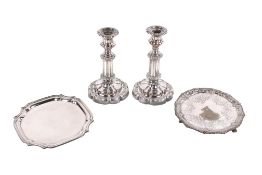 A small group of silverplated tableware.