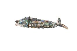 A Mexican novelty bottle opener In the form of an articulated mother of pearl fish.