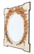A contemporary oval wall mirror.