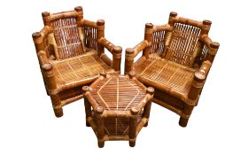 Pair of substantial bamboo armchairs and a table. Max.