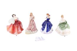 A group of four assorted porcelain lady figurines.