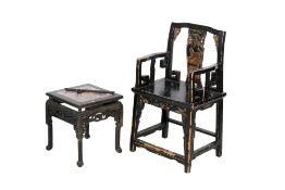 A 19th/20th century Chinese armchair and a marble inlaid pot table.