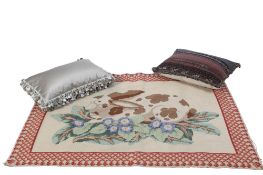 A rug and large cushion.
