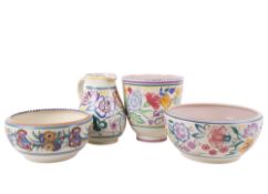 A group of four assorted larger mid-century Poole Pottery. Including a jug, vase and bowls. Max.