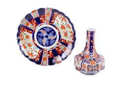 A large 20th century Imari charger with crimped rim and a similar octagonal vase. Max.