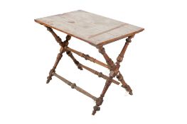 A carved X framed oak rectangular table.