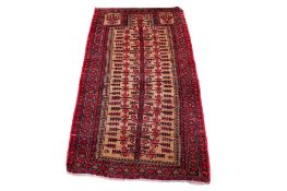 A small wool and silk handmade Shiraz runner rug.
