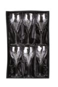 A set of six Crystal Design hand cut wine glasses, boxed. H20.