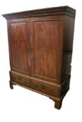 A Georgian mahogany wardrobe.