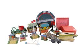 A collection of assorted vintage Hornby, Meccano tin plate model railway layout accessories.