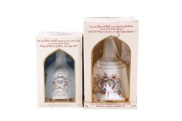 Two bottles of Bells Whisky Royal Commemorative Wade decanters. 50cl and 75cl both boxed.