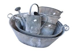 Two Galvanised oval baths, two watering cans and three buckets. Max.