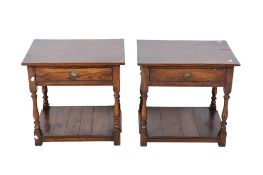 Pair of 20th century stained oak low side tables. Each having a drawer with lower under tier shelf.