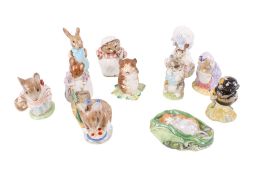 A collection of eleven assorted Beatrix Potter's character figures.