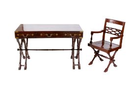 A stained mahogany brass bound and inlaid desk with matching chair.