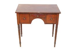 An Edwardian mahogany dressing or writing table.