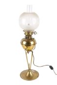 Late Victorian brass 'In Lux Way' converted oil lamp and stand.