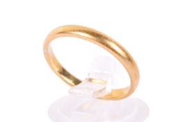 A 22ct gold wedding band, Hallmarked to the shank, size M, weight 3g.