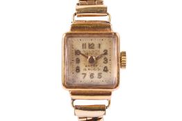 A Boldor Ancre Geneve 18ct gold lady's wristwatch. With gilt Arabic numerals, case 2.2cm x 1.