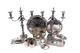 A collection of silverplated tableware. Including candlesticks, trays, dishes, etc.
