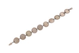 A silver thrupenny bit bracelet. The coins dated from 1905 to 1920, length 20cm, gross weight 16g.