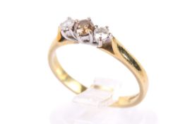 An 18ct gold and diamond three stone ring.