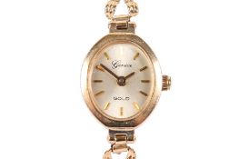 A 9ct gold lady's Geneve Gold quartz dress watch.