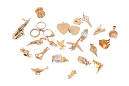 A group of 9ct gold charms.