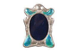 An Art Nouveau style silver mirror.