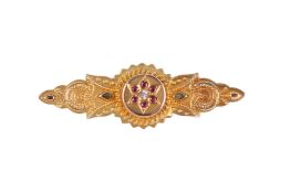 A Victorian Etruscan style yellow metal bar brooch.