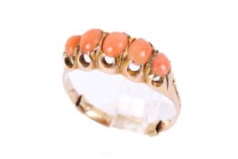 A 9ct gold and coral stone ring.