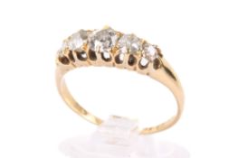 An 18ct gold and five stone diamond ring. The stones of graduated size, the largest circa 4mm x 4mm.