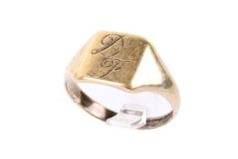 A 18ct gold signet ring. Engraved DF, hallmarked, size V, weight 6.9g.