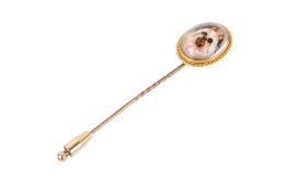 A Victorian rock crystal intaglio tie pin.