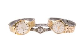 Three assorted wristwatches.