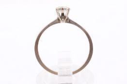 An 18ct gold diamond solitaire ring by Canadian Ice. Brilliant cut diamond, circa 0.