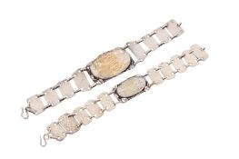 Two white metal and mother of pearl bracelets.
