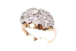 A yellow metal dress ring.