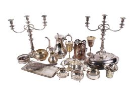 A box of assorted silverplated table items.