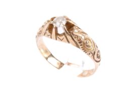 A gold and diamond ring. Set with an old cut diamond of 0.